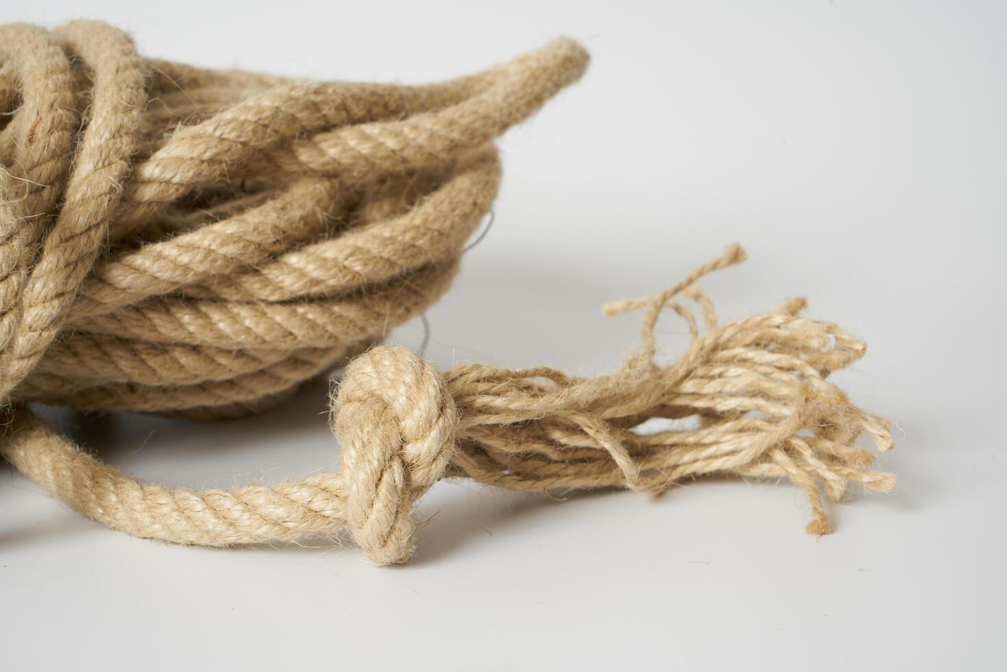 brown rope on white background photo