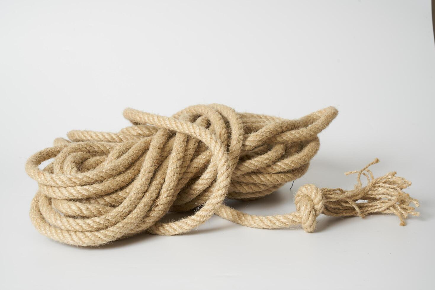 brown rope on white background photo