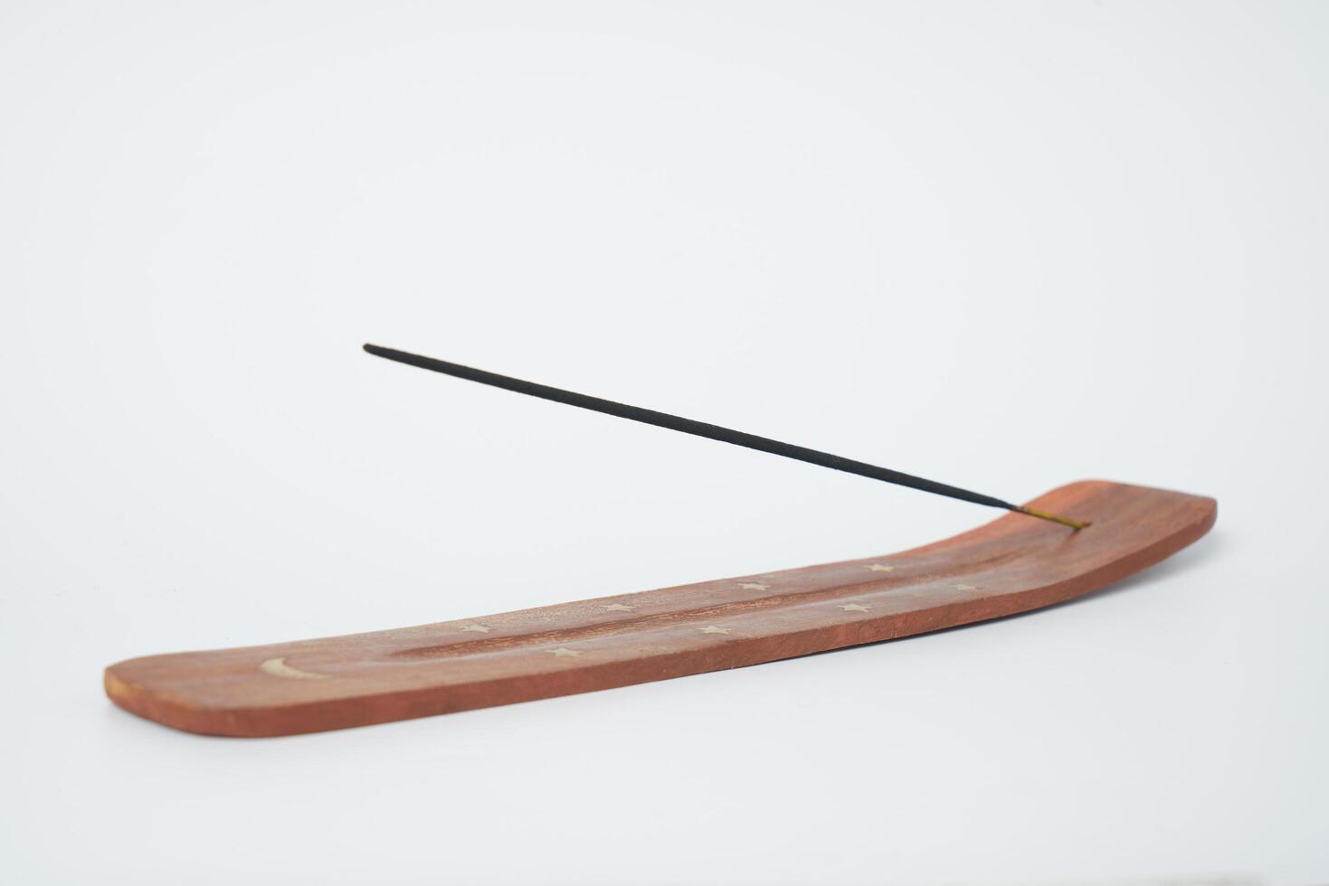 Wooden incense burner photo