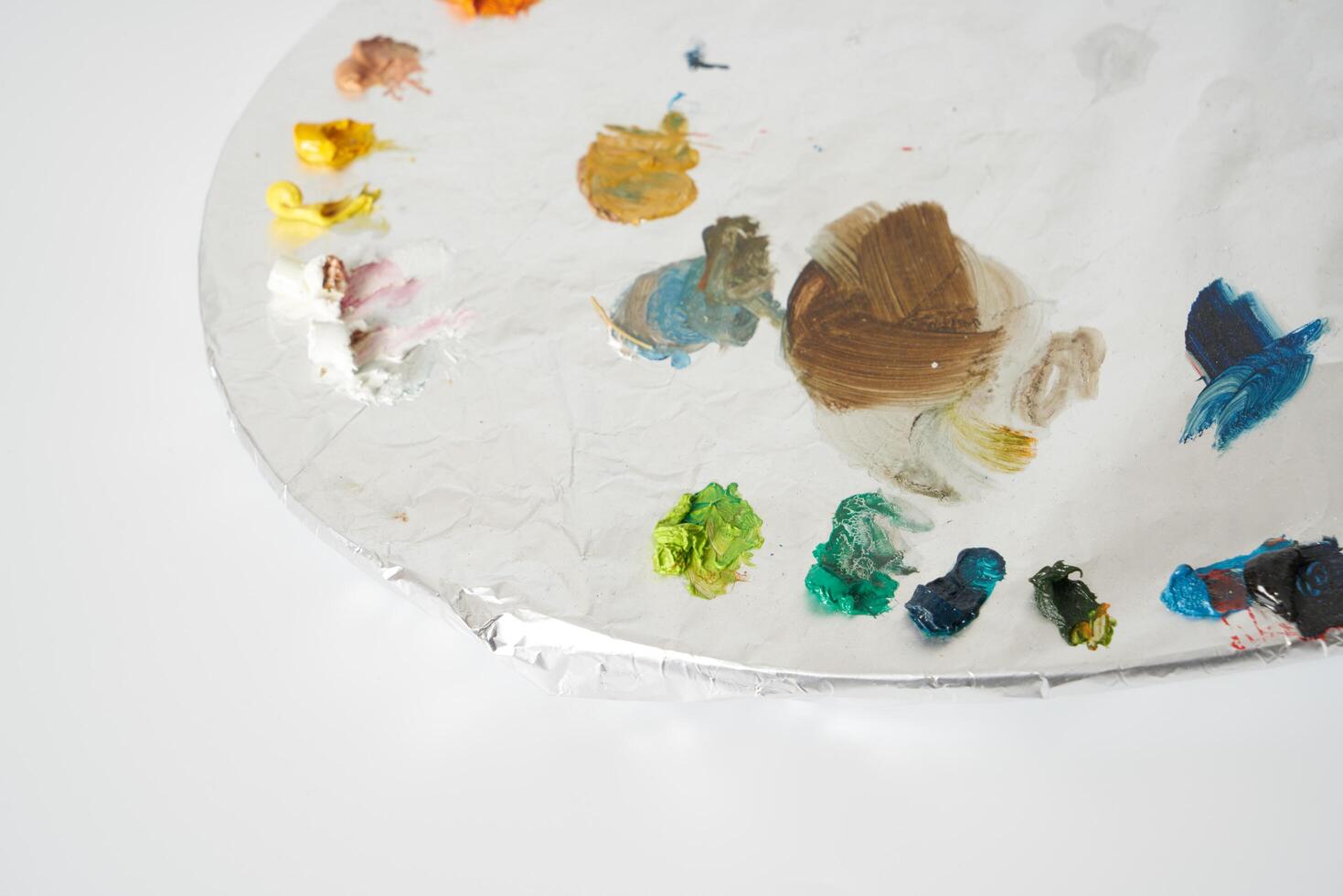 Oil paint on painters palette photo