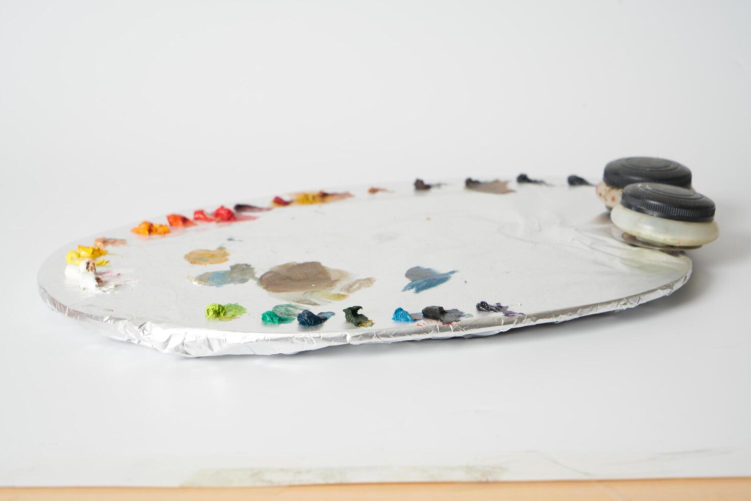Oil paint on painters palette photo