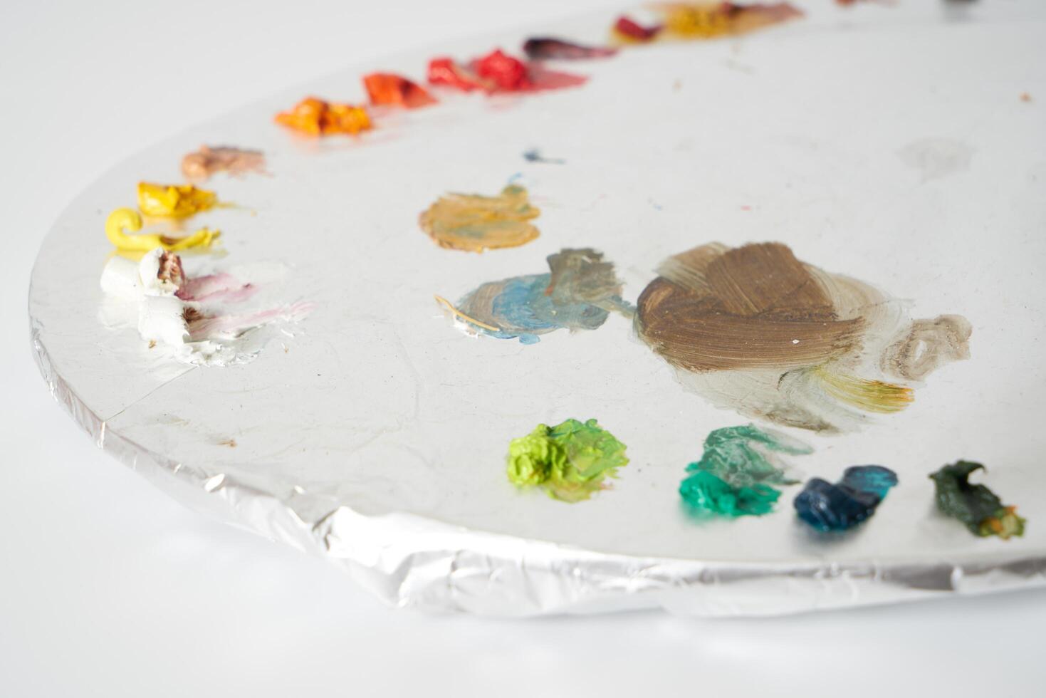 Oil paint on painters palette photo