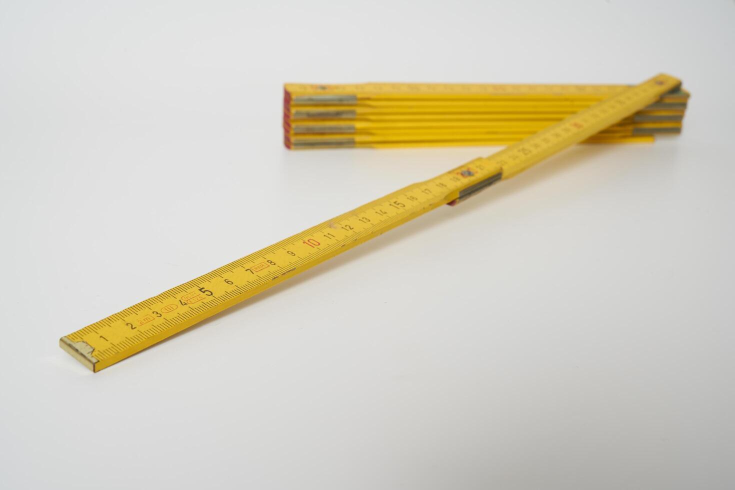 retro retractable wooden carpenters ruler photo