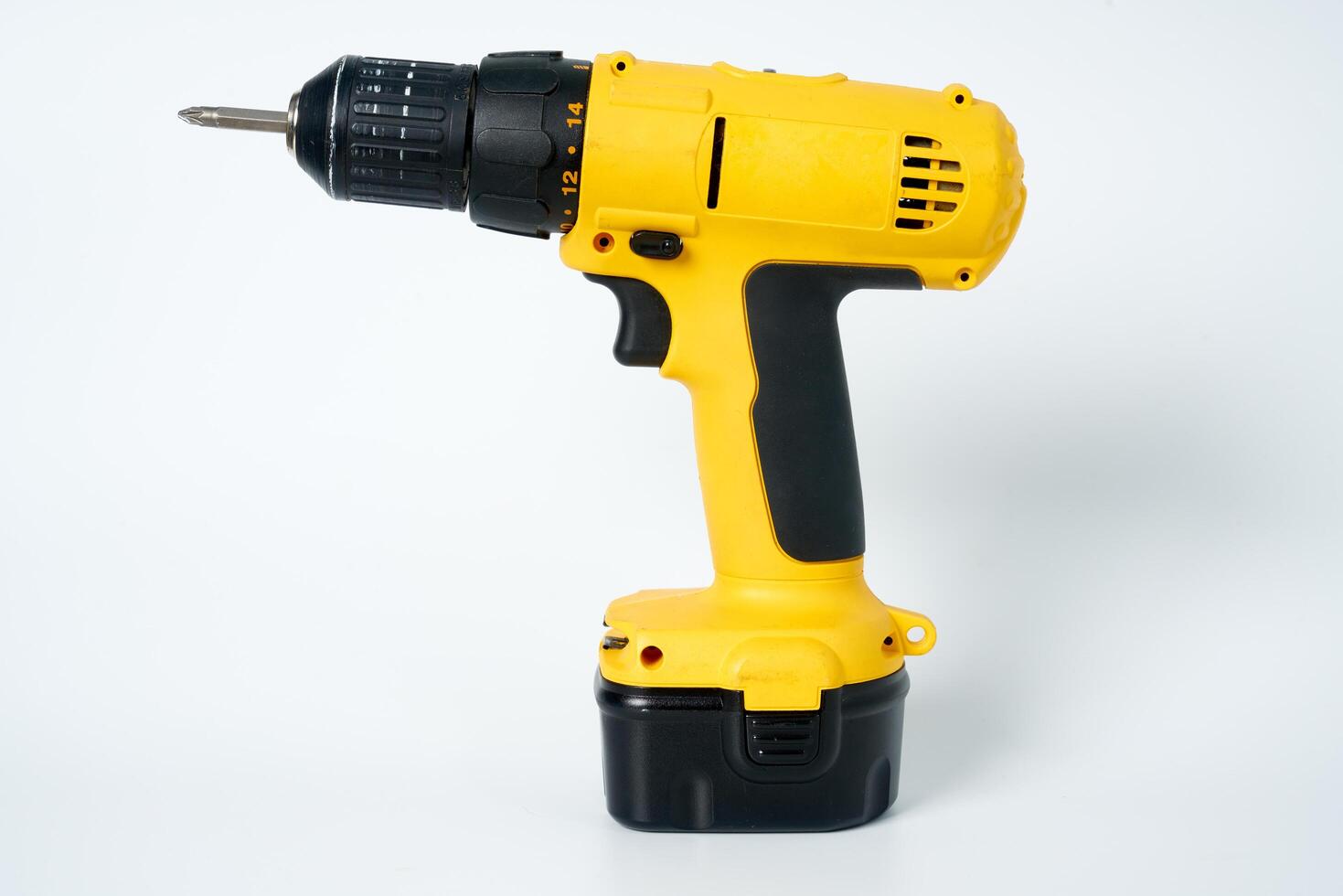 Yellow and black cordless drill. photo