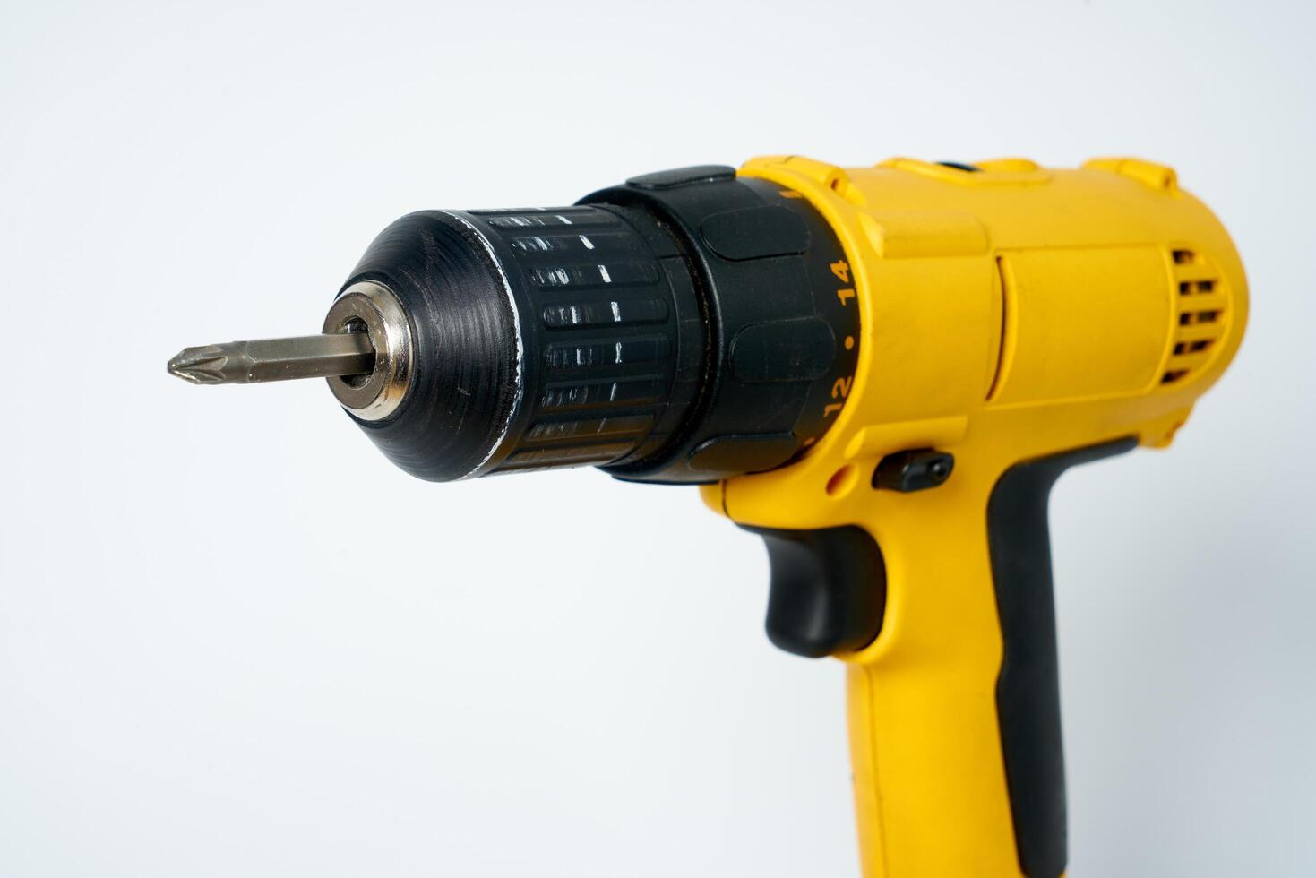 Yellow and black cordless drill. photo