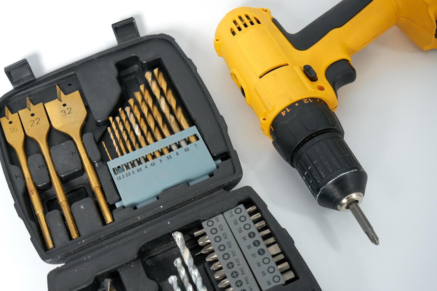 Yellow and black cordless drill. photo