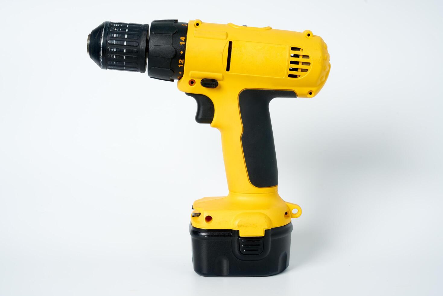Yellow and black cordless drill. photo
