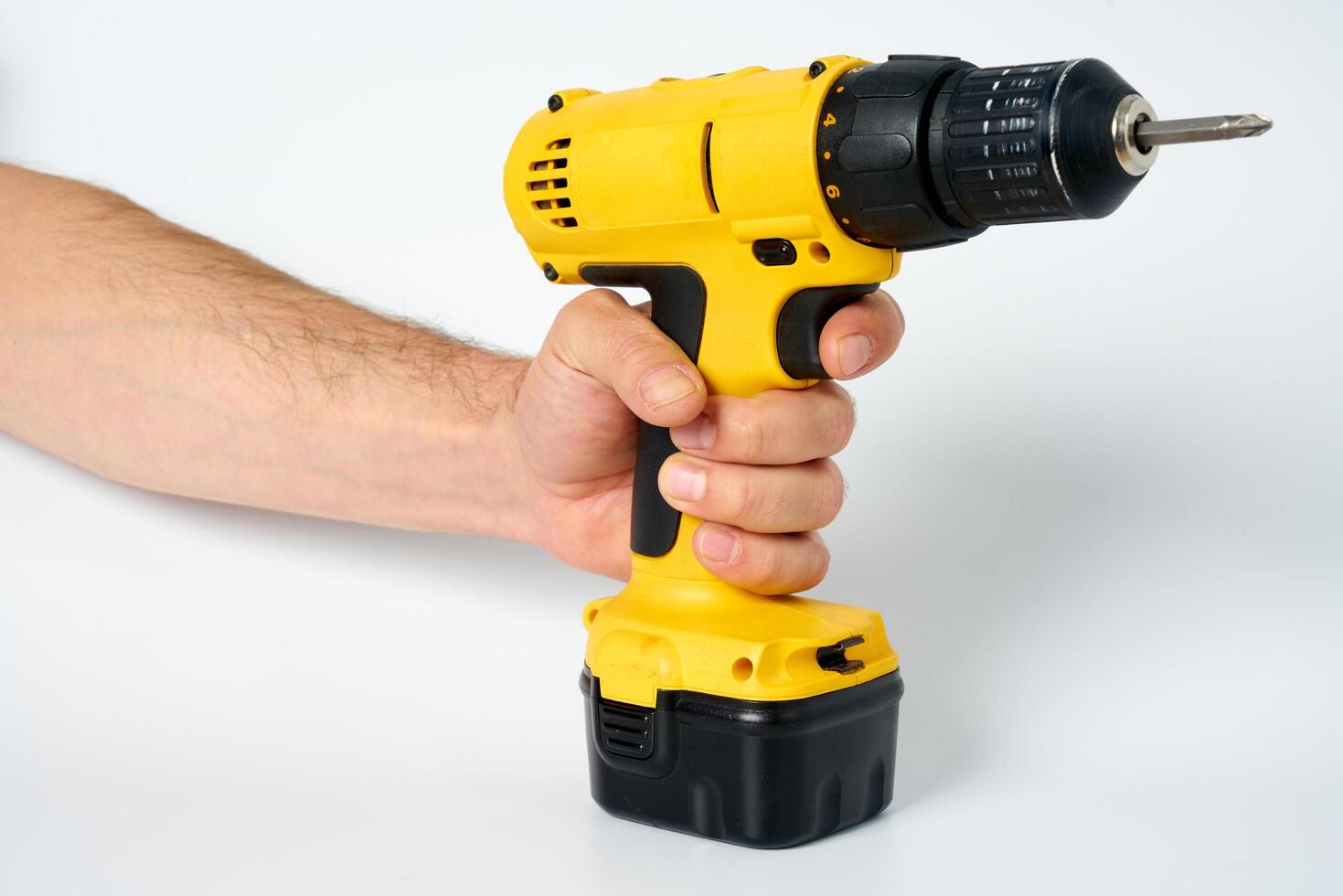 Yellow and black cordless drill. photo