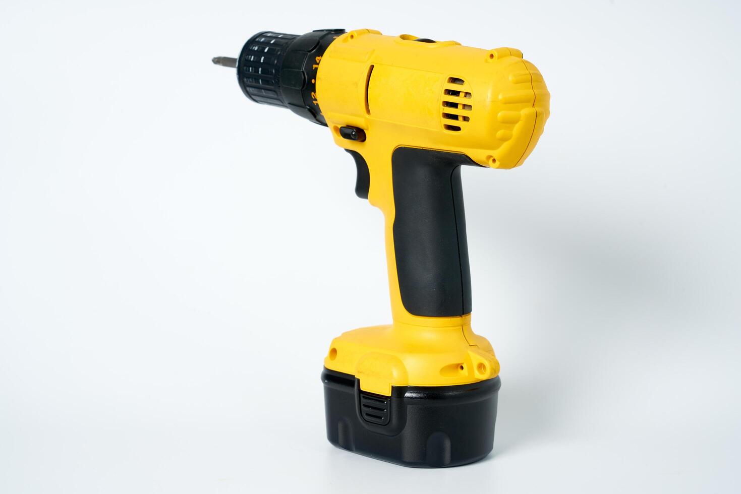 Yellow and black cordless drill. photo
