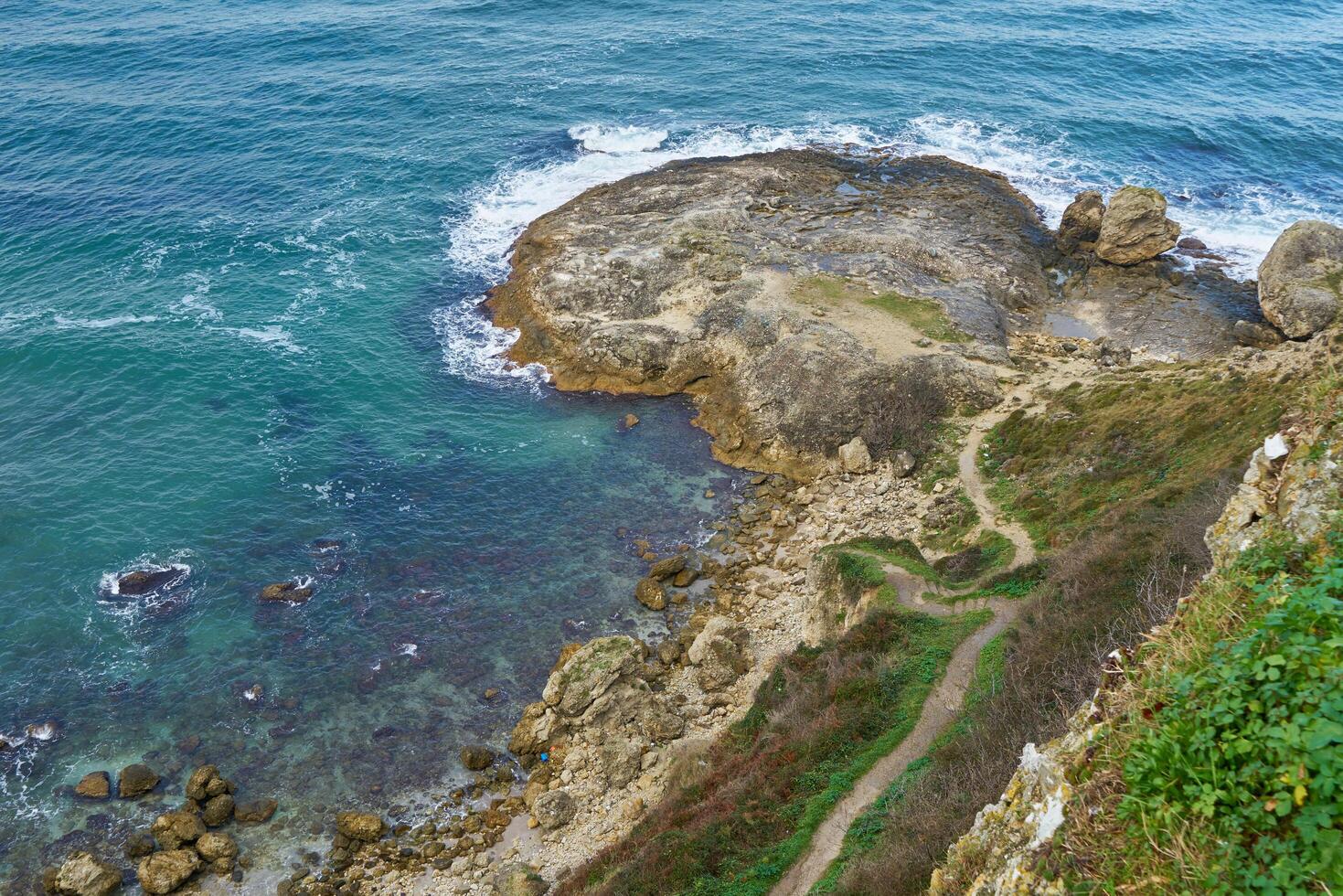 Rocky seashore in winter photo