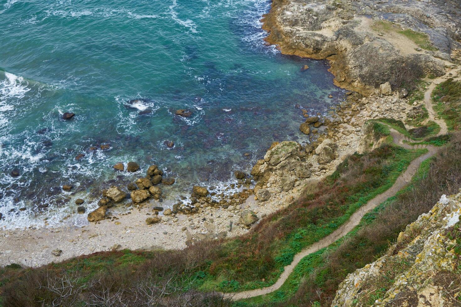 Rocky seashore in winter photo