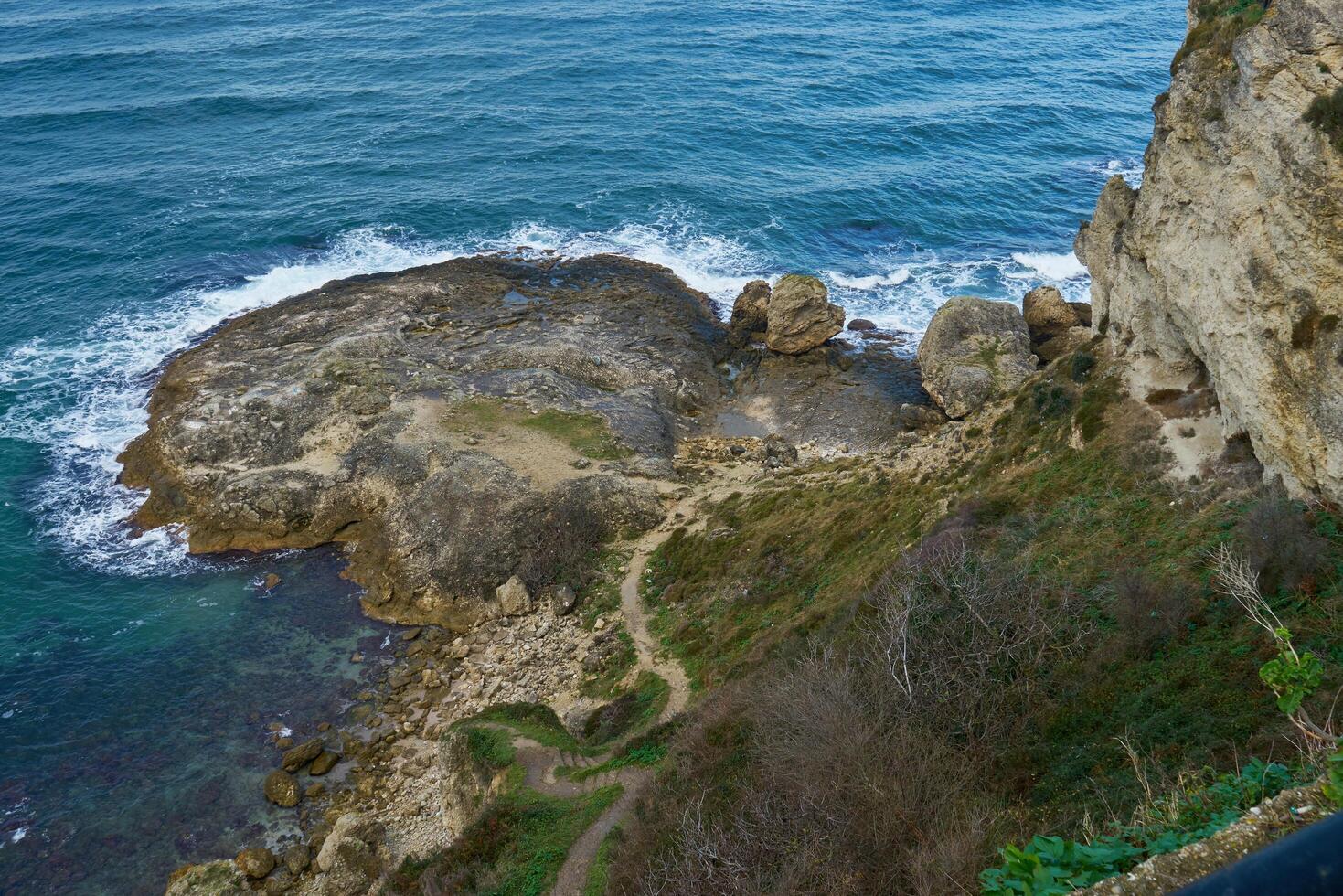Rocky seashore in winter photo