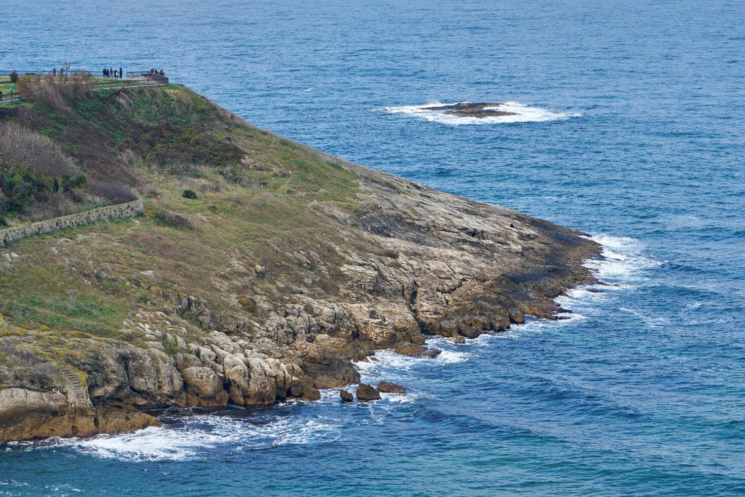 Rocky seashore in winter photo