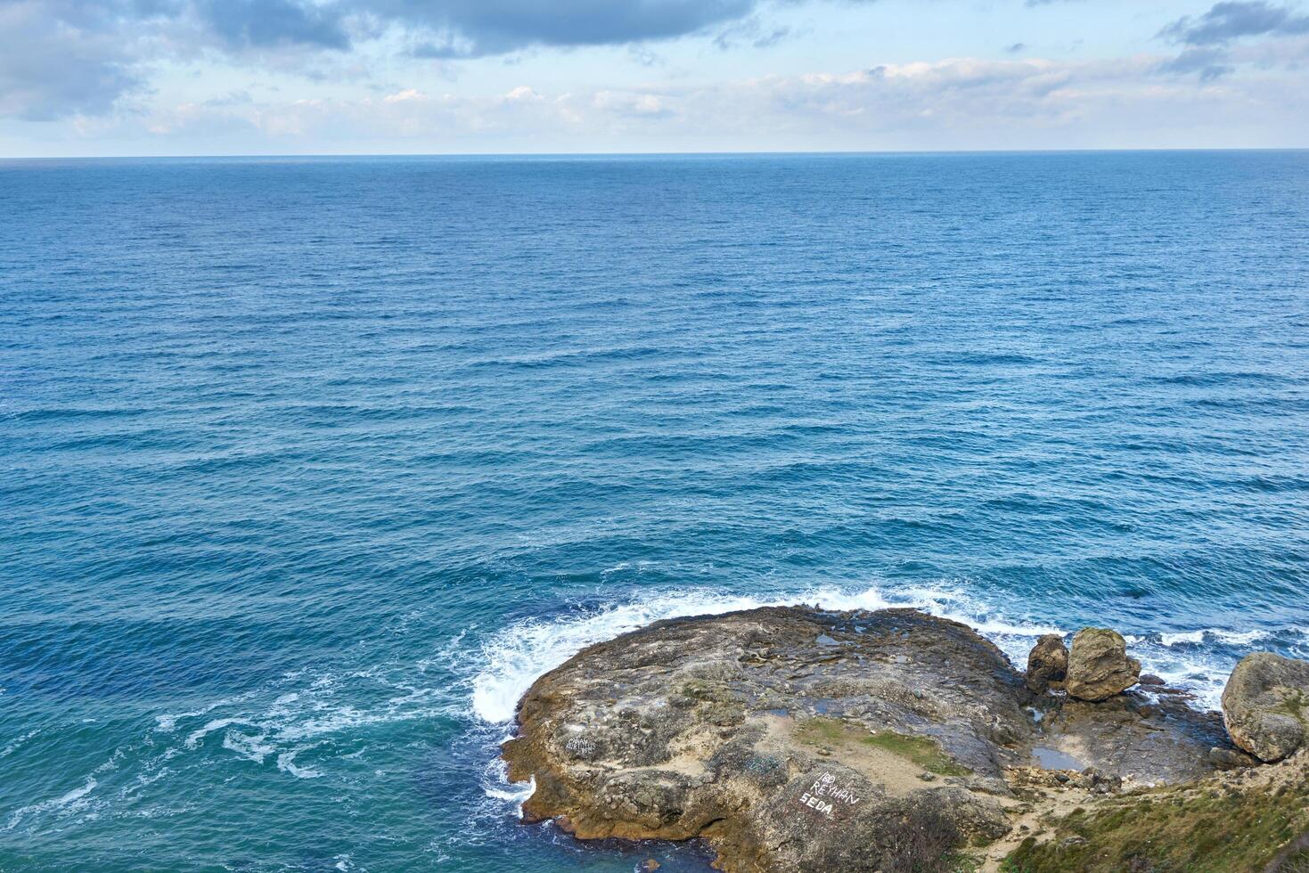Rocky seashore in winter photo