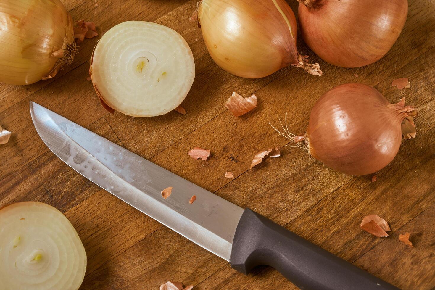 Onions on a cutting board photo