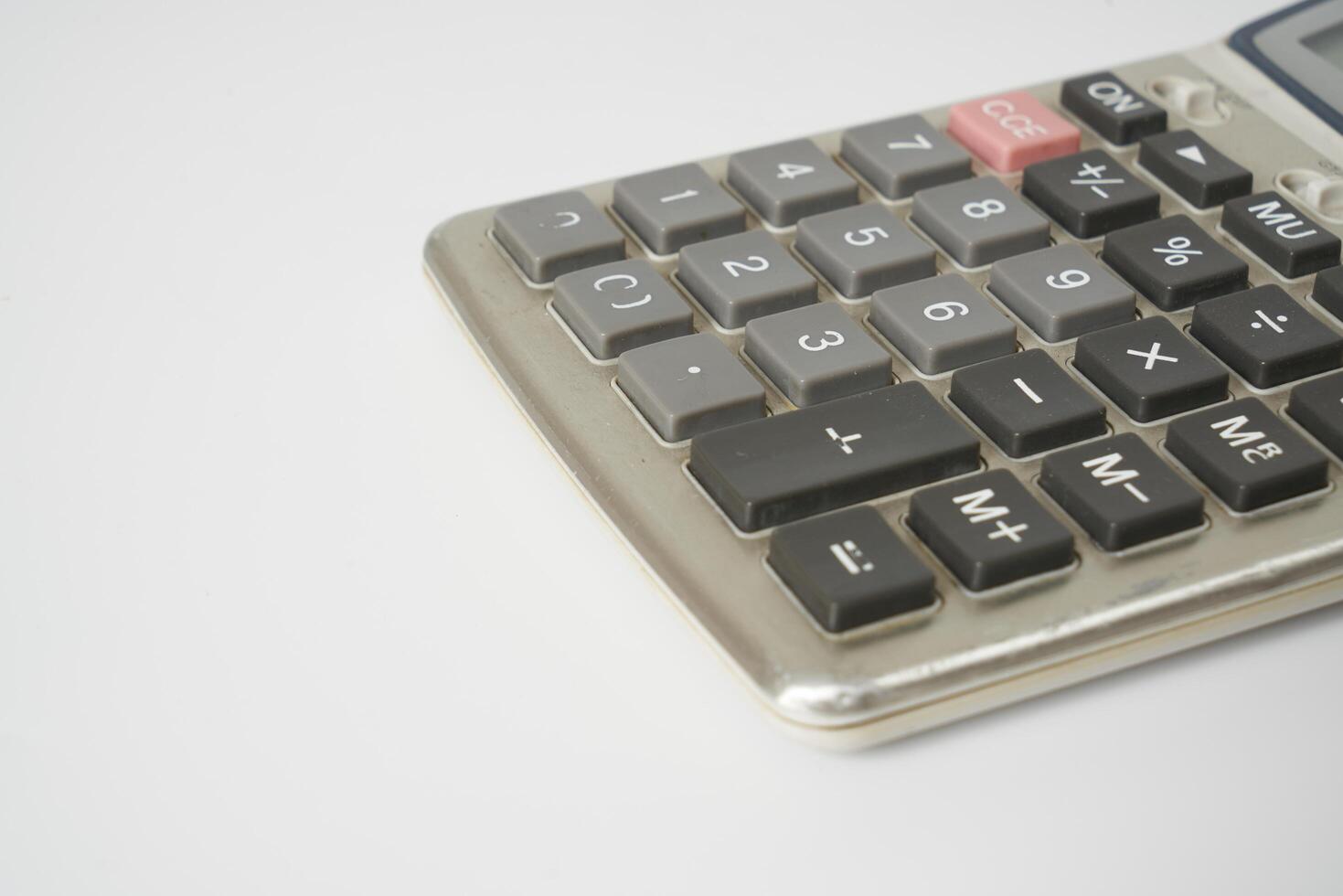 retro calculator on white background photo