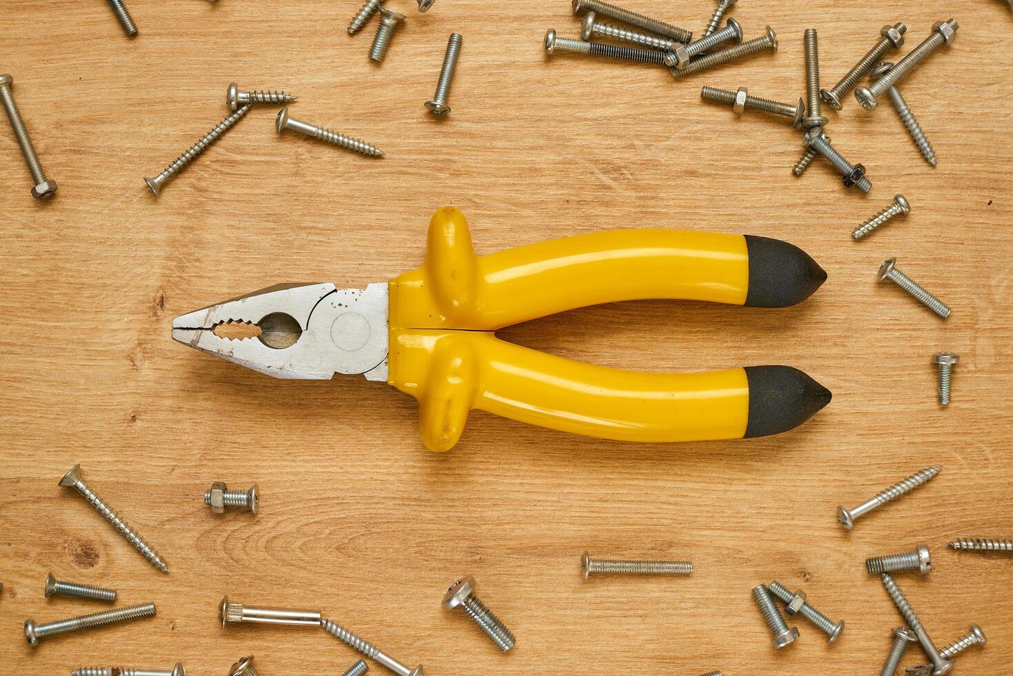 Pliers on a table photo