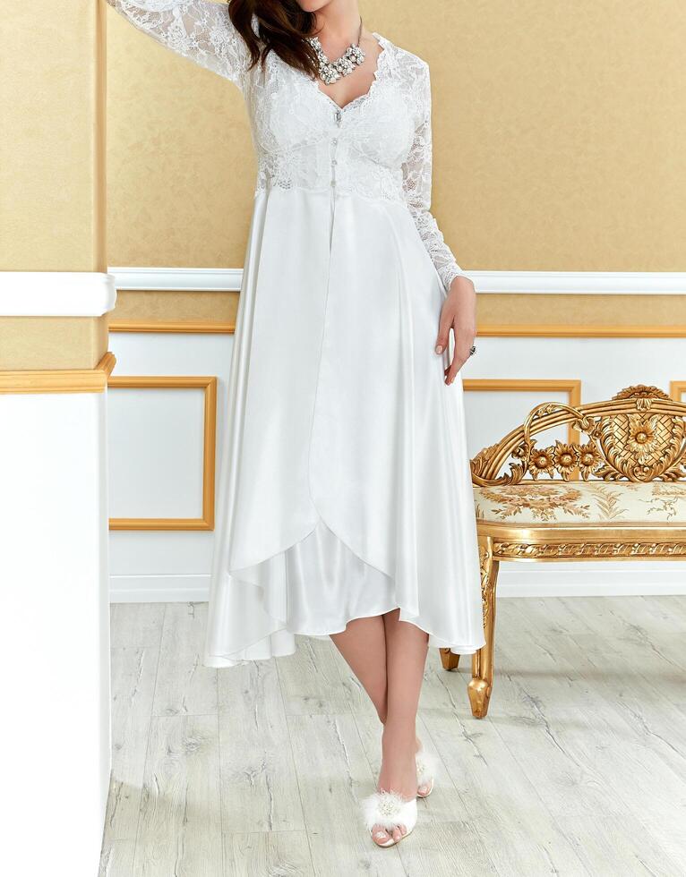 Female fashion model wearing a satin nighty photo