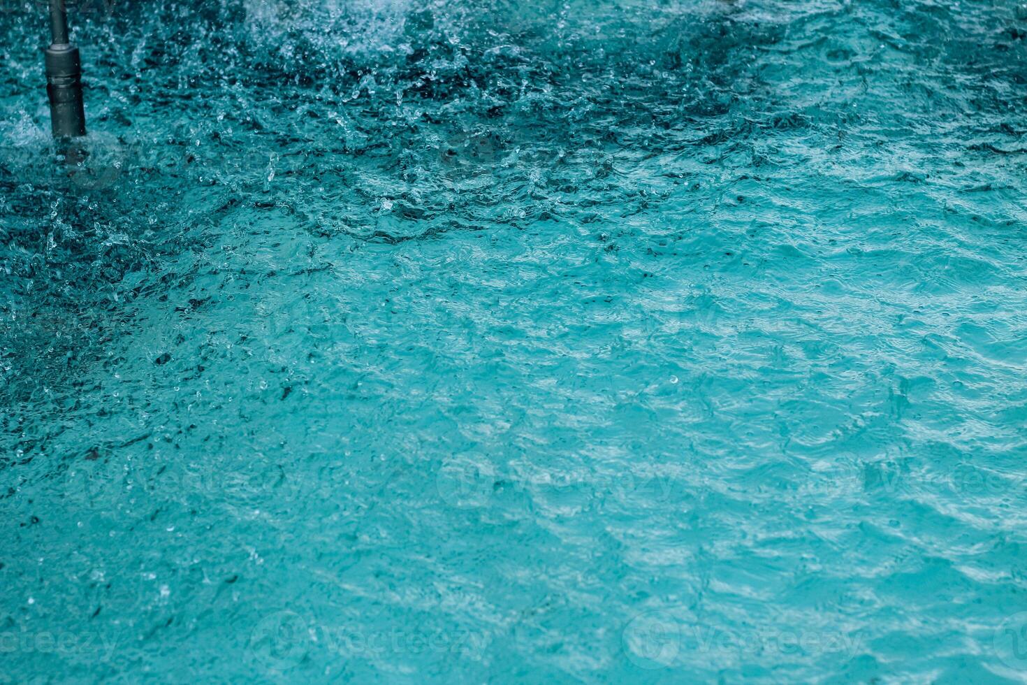Texture of blue water in a fountain photo