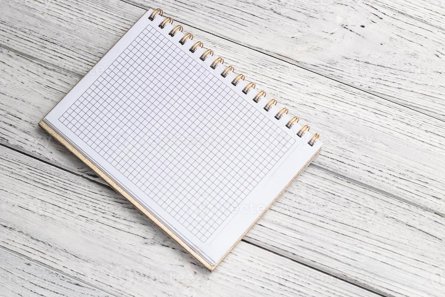 Notebook diary for planning and studying on the table. photo