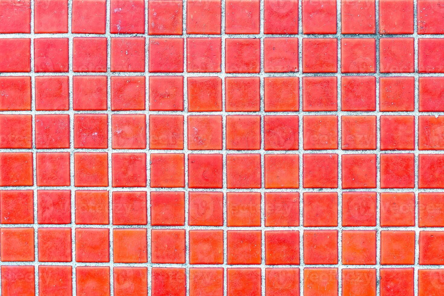 Texture of red mosaic tiles, close-up photo