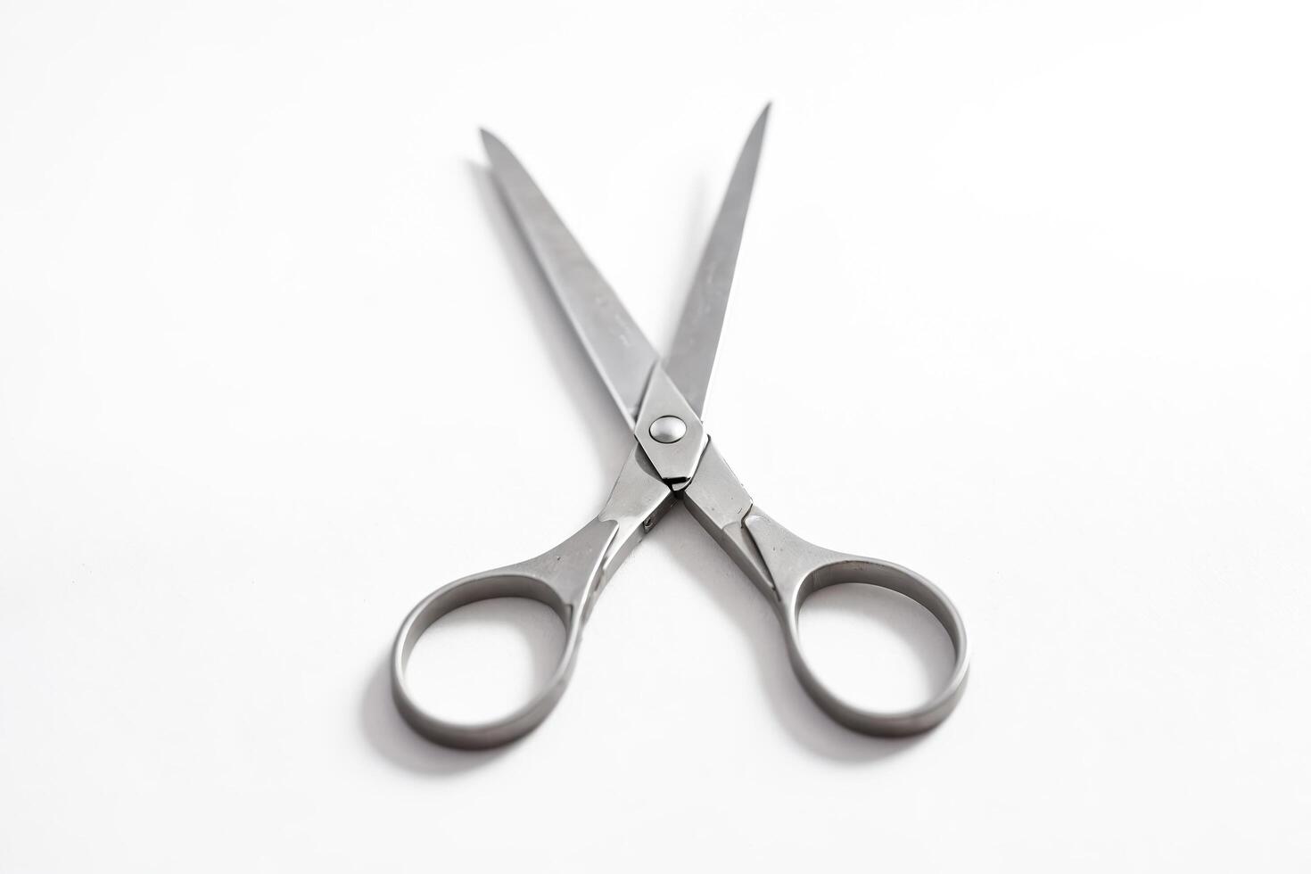 Close-up of Silver Scissors on a White Background photo