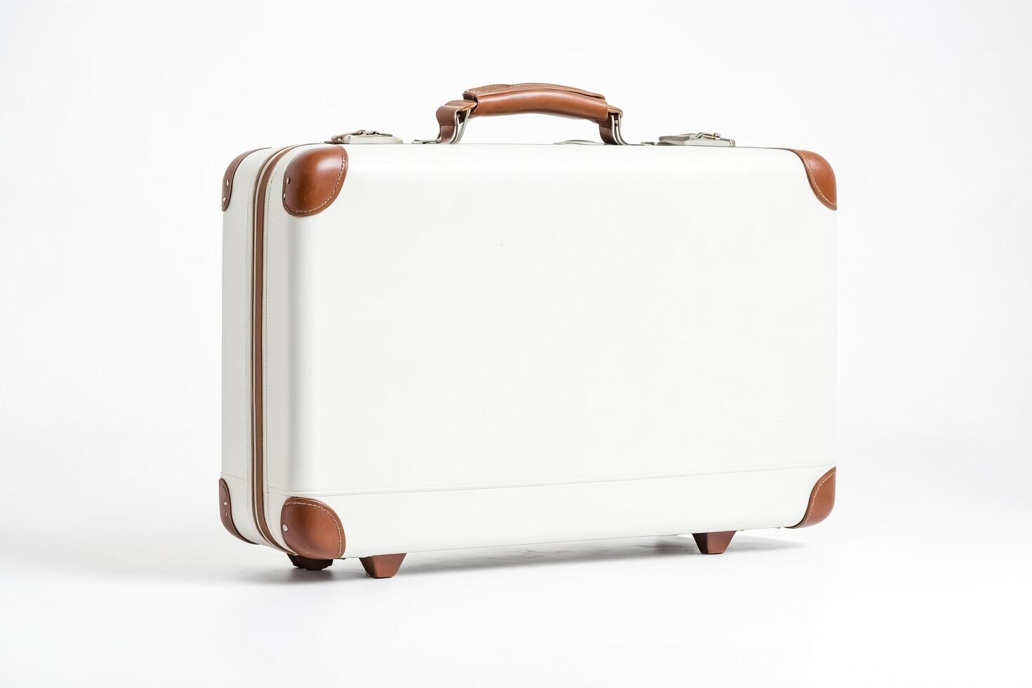 White Suitcase with Brown Leather Accents photo