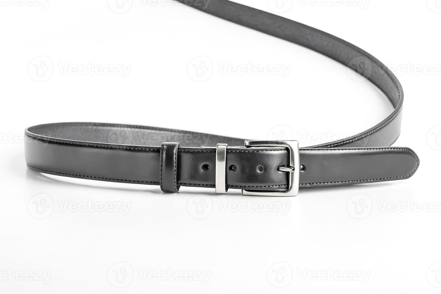 Black leather belt with silver buckle on white background photo