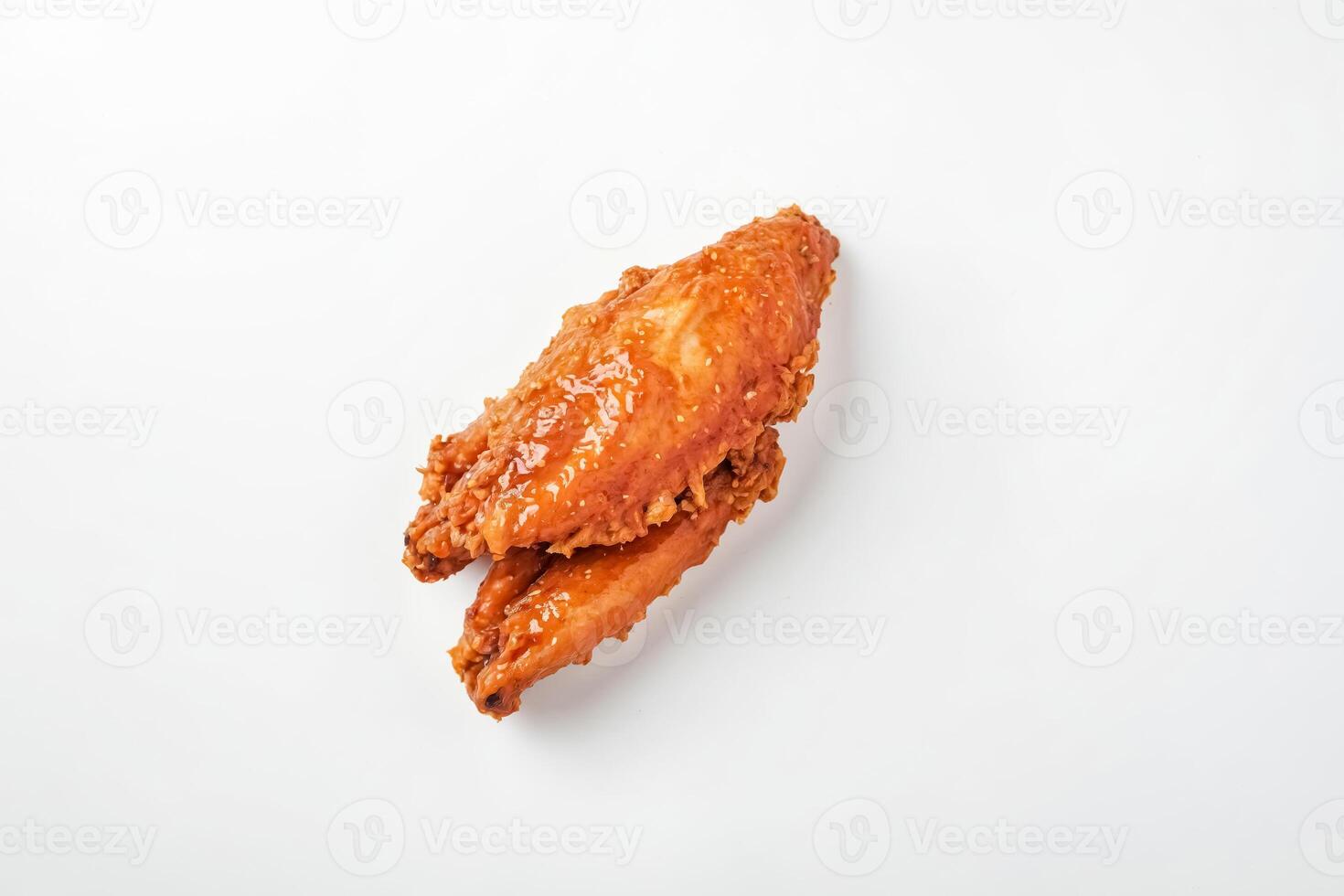 Crispy Fried Chicken Wing on a White Background photo