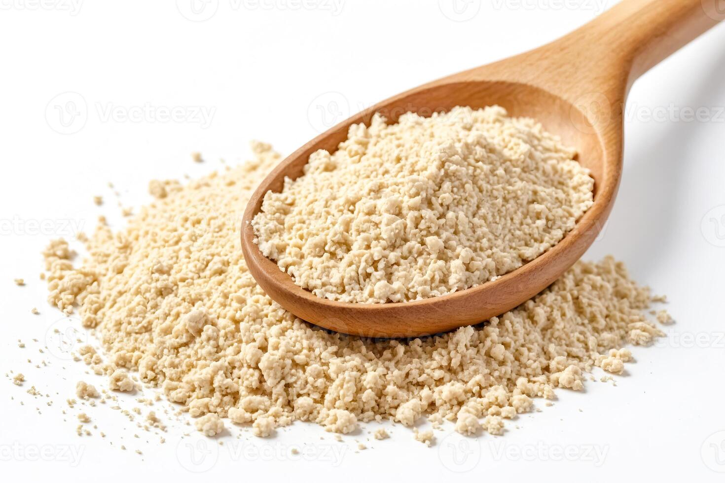 Heap of Grated Grits in Wooden Spoon photo