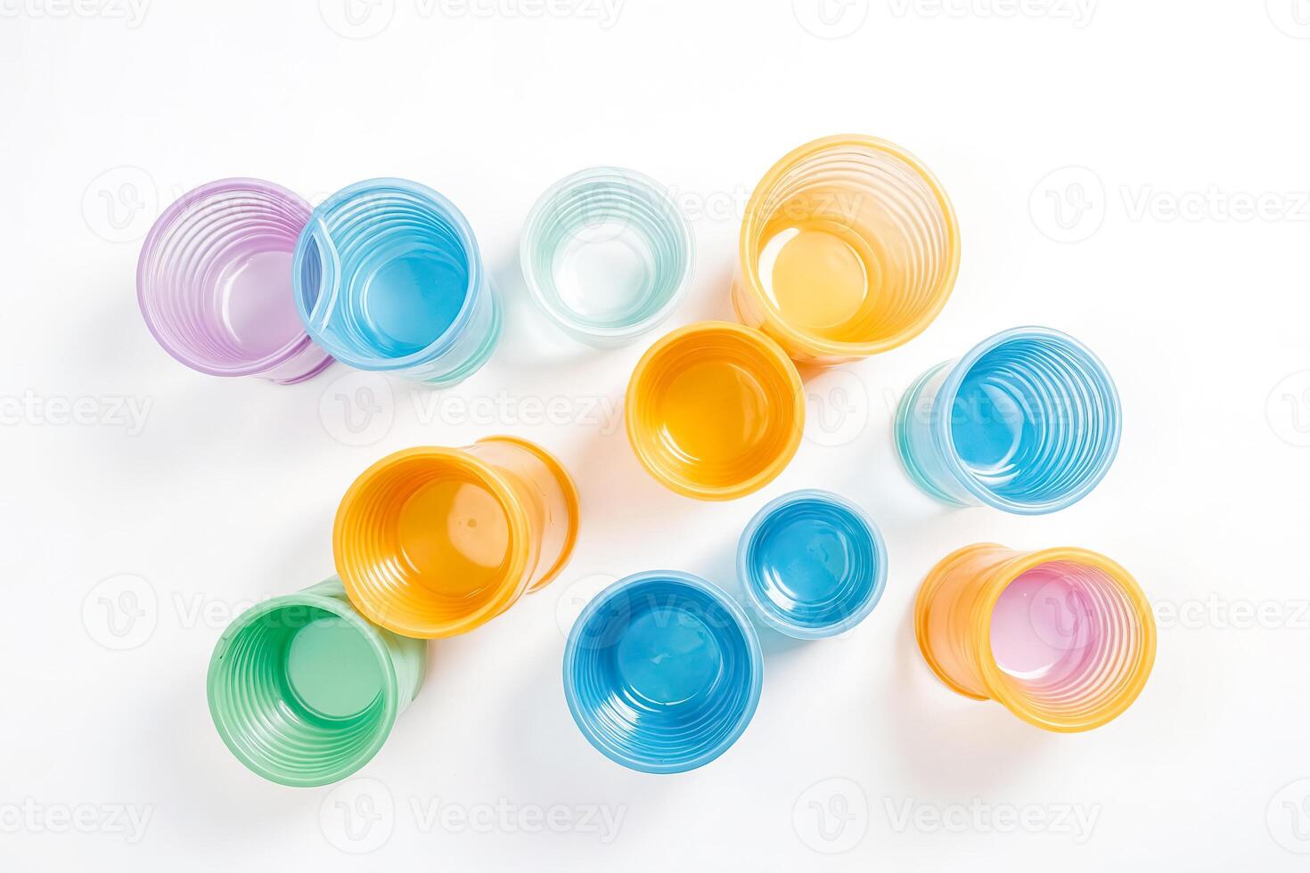 Colorful Plastic Cups on White Background photo