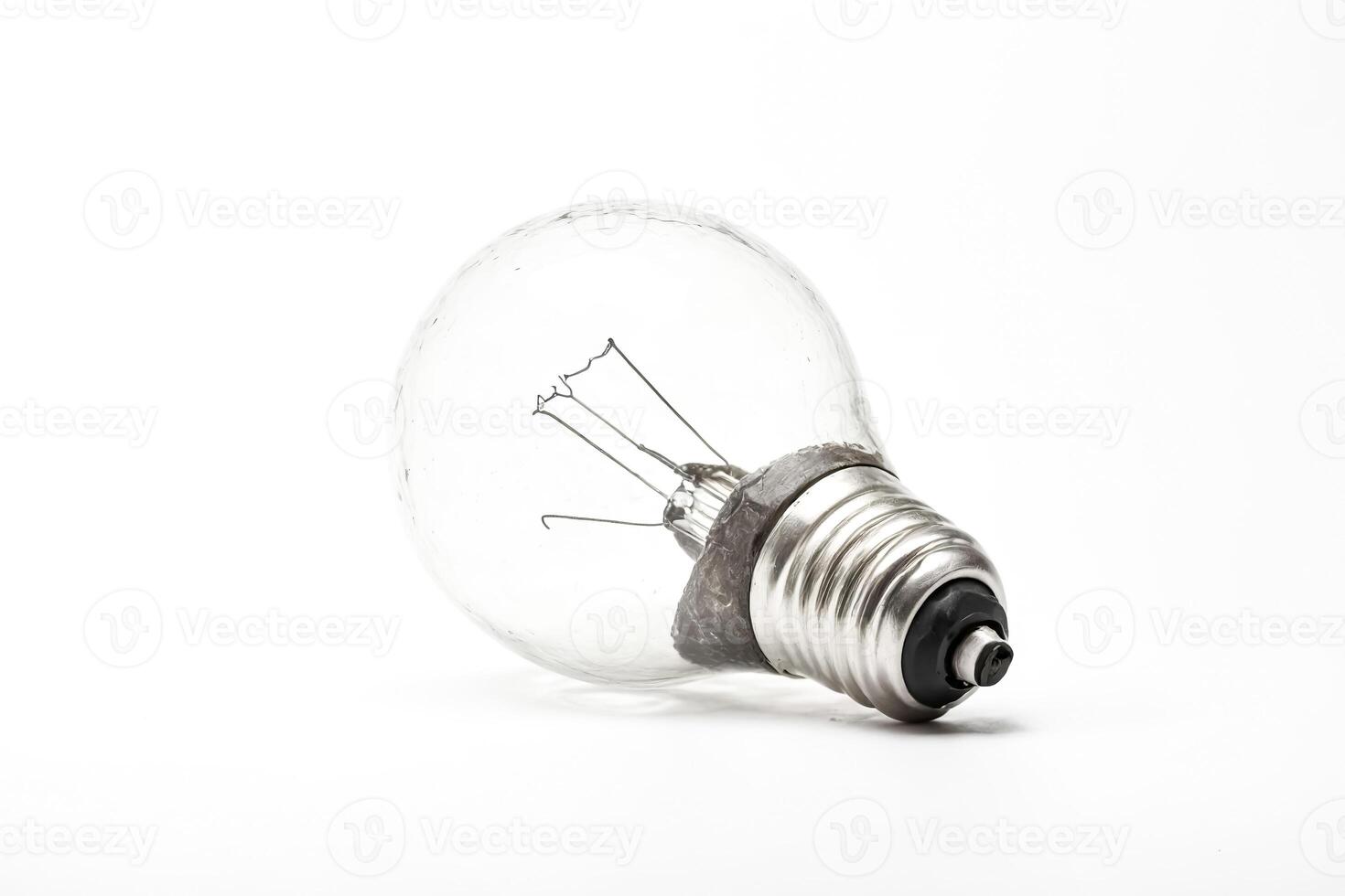 A Single Light Bulb on a White Background photo