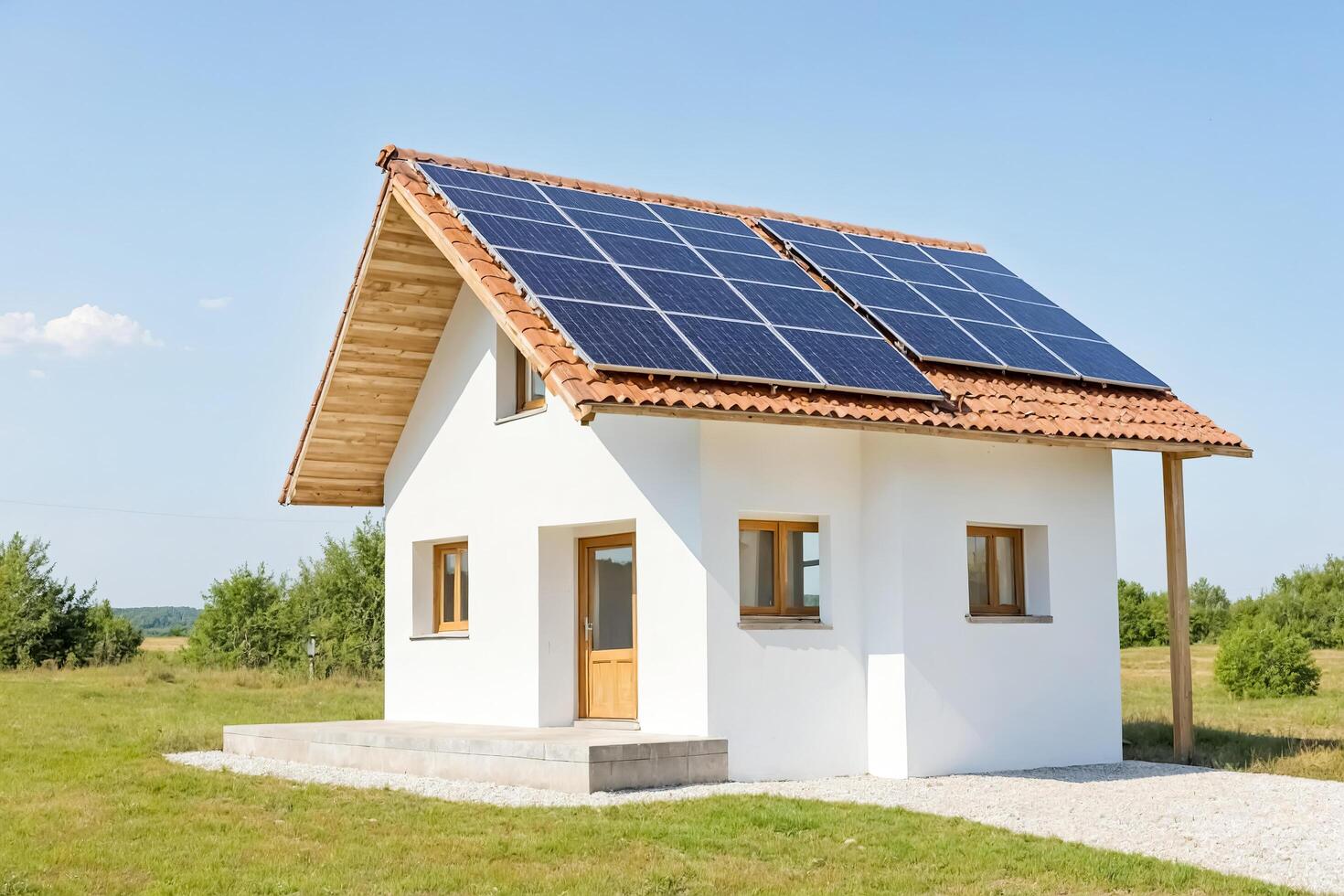 Small House With Solar Panels On The Roof photo