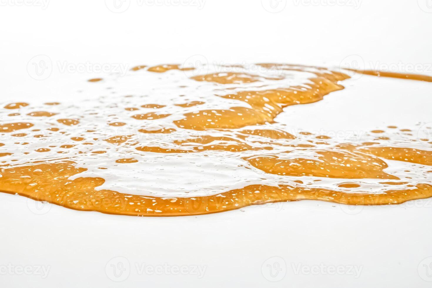 Honey Drizzle On White Background photo