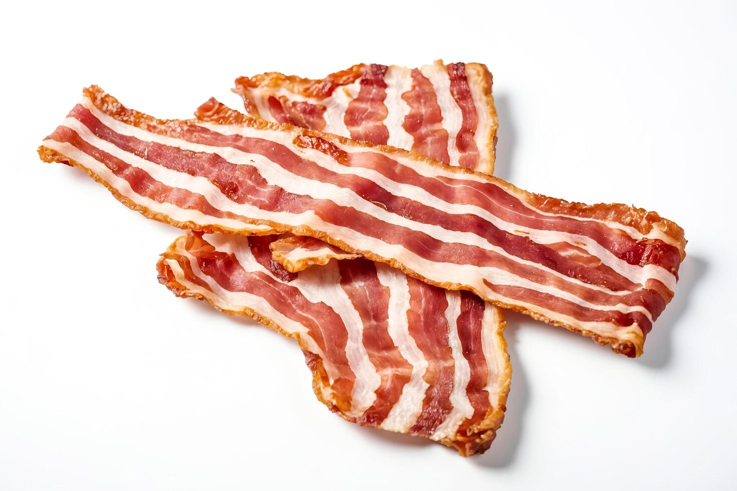 Crispy Bacon Strips on White Background photo