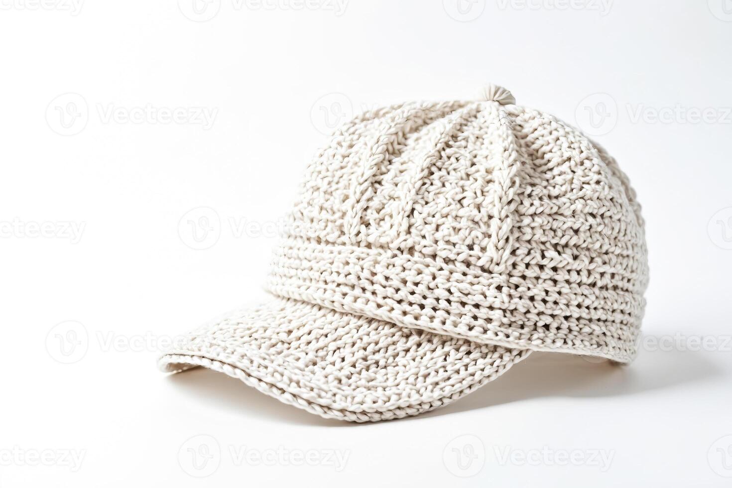 White Knitted Baseball Cap Isolated on White Background photo