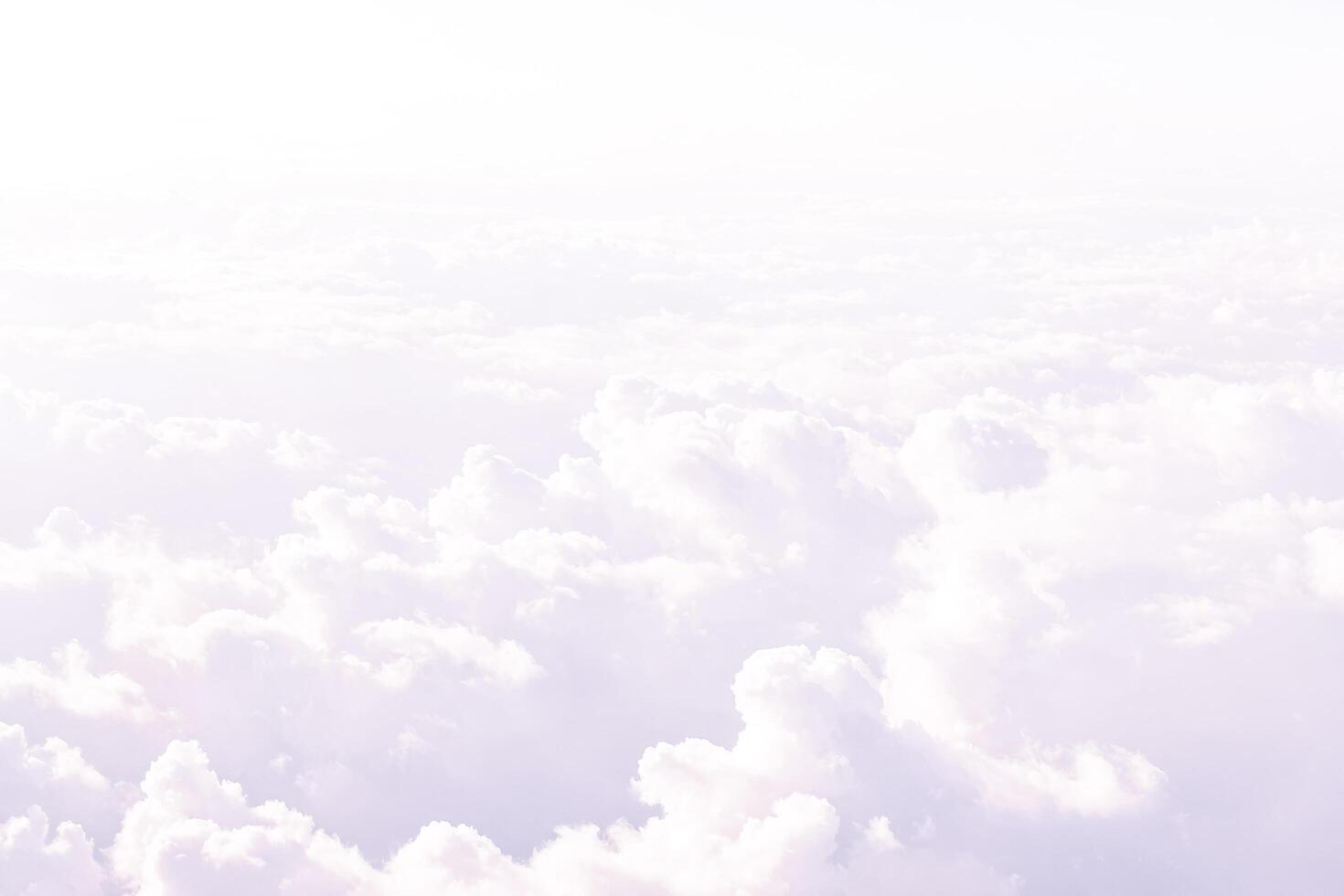 Fluffy White Clouds In A Lavender Sky photo