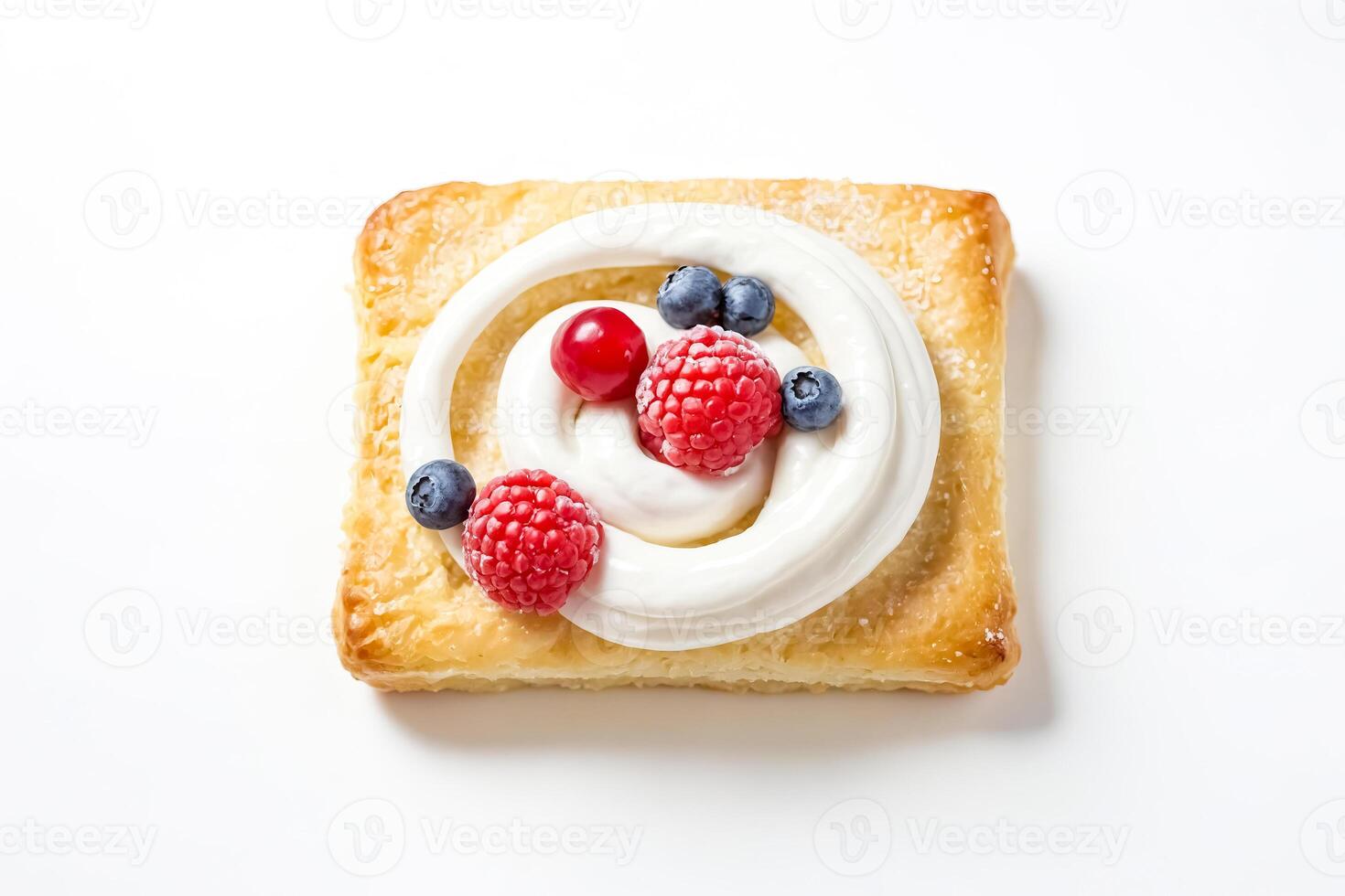 Pastry with Whipped Cream and Berries photo