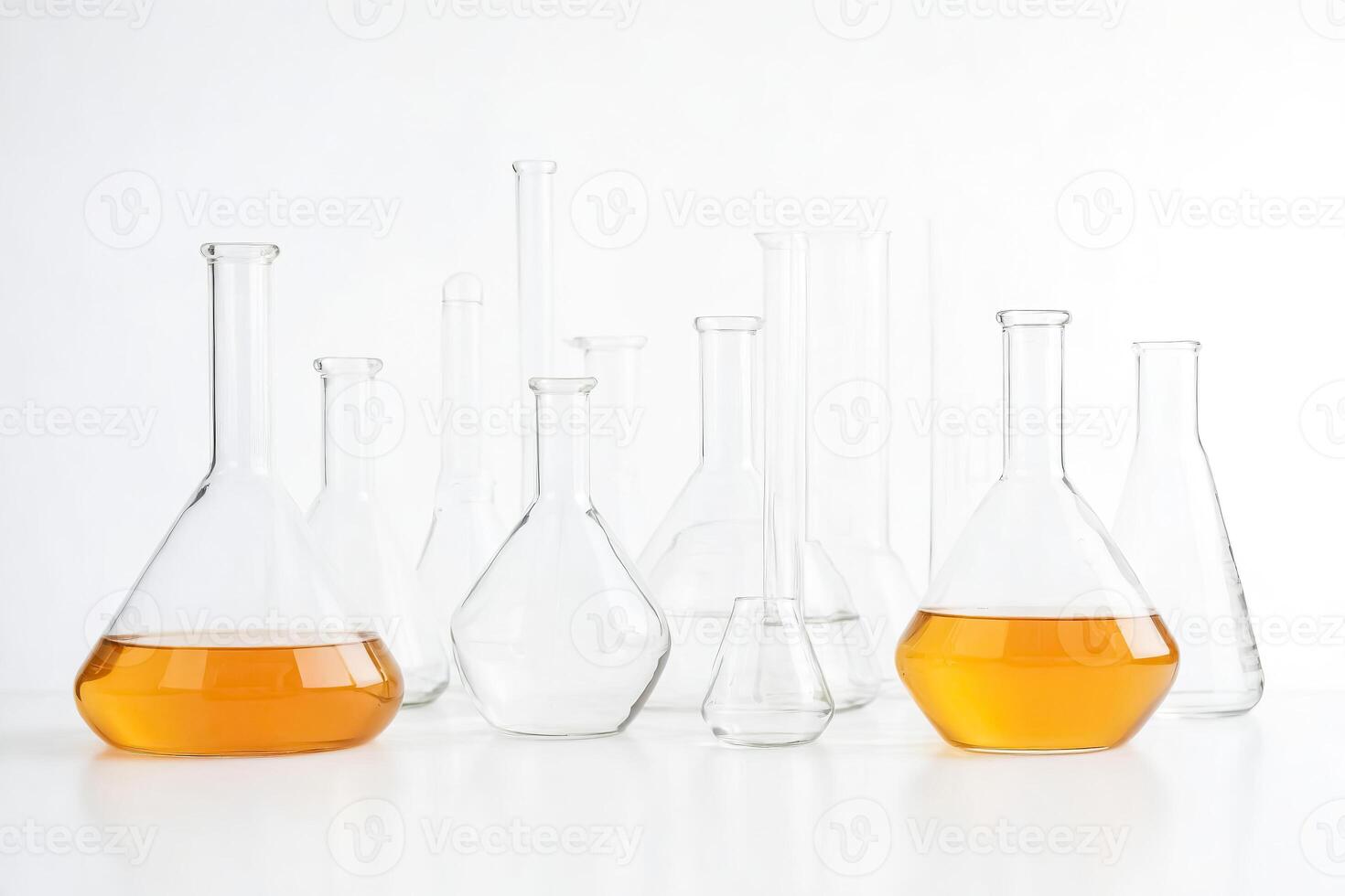 Glass beakers filled with liquid photo