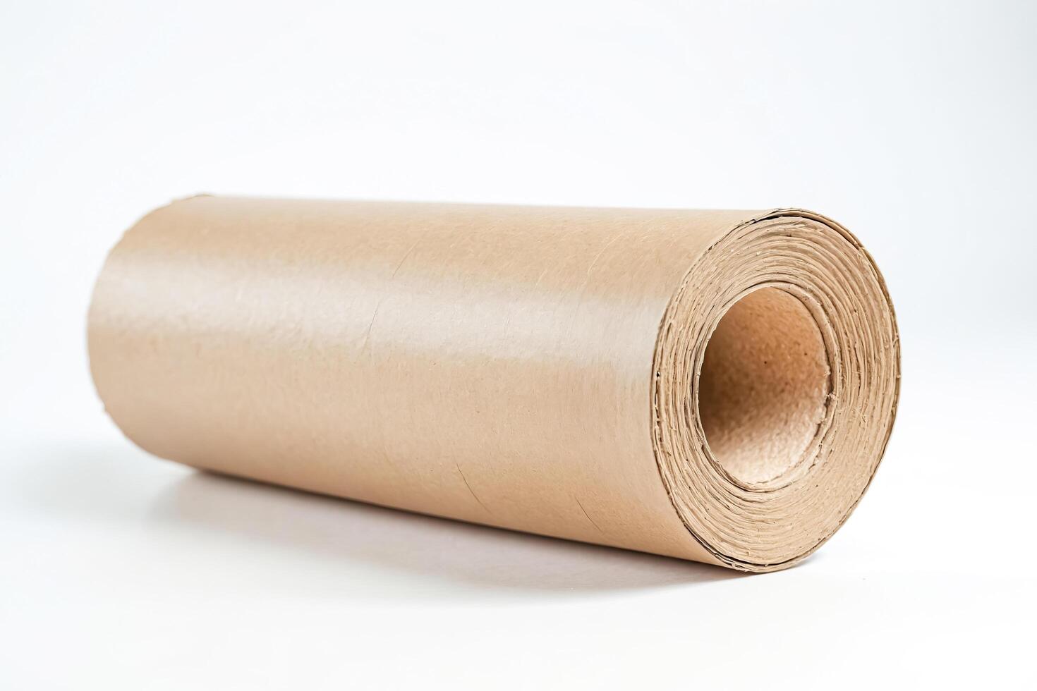 Roll of brown paper on white background photo