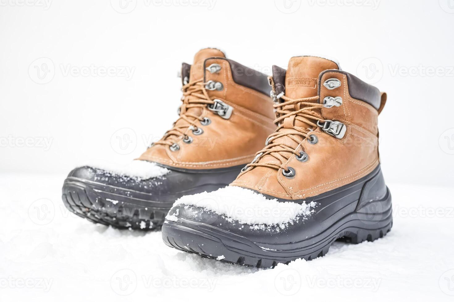 Warm Winter Boots in the Snow photo