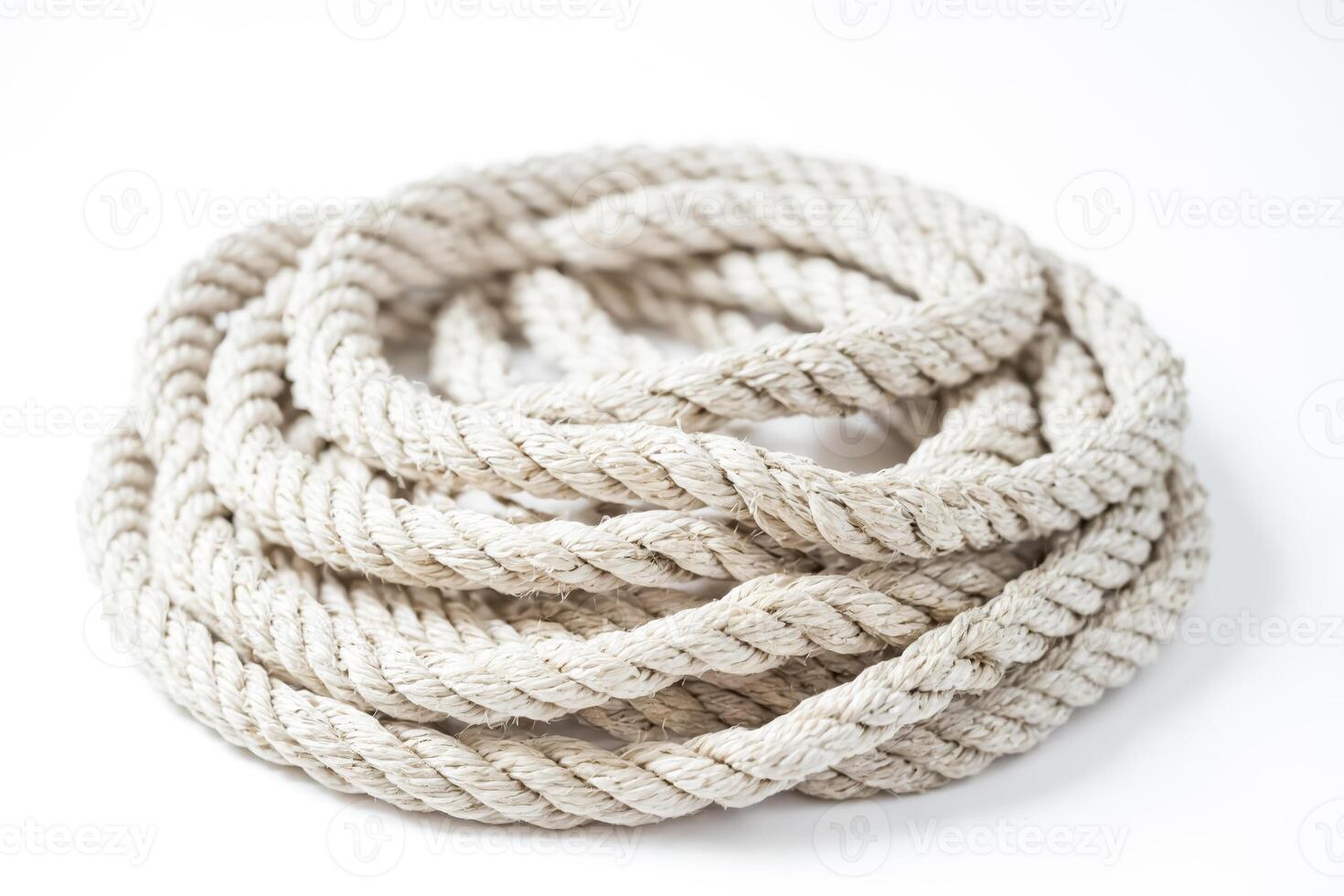 Close-up of a white rope coil on a white background photo