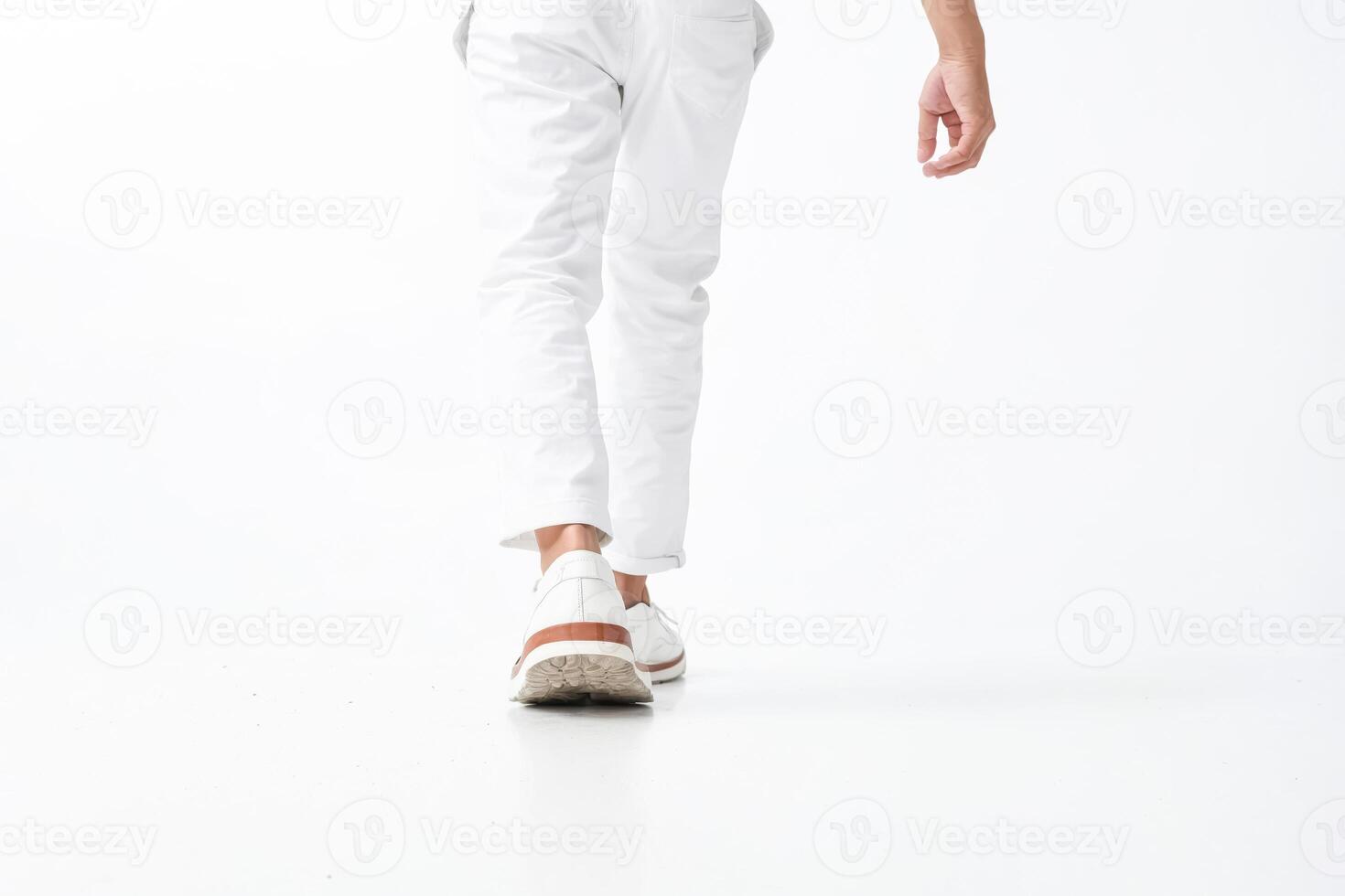 Casual Stride White Pants and Sneakers on the Move photo