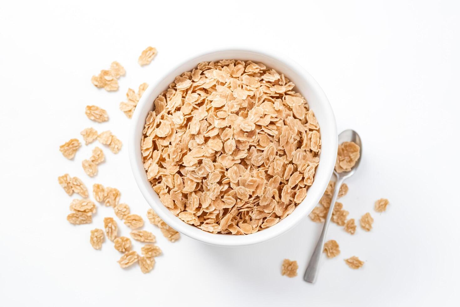 Bowl of Oats Cereal with Spoon photo