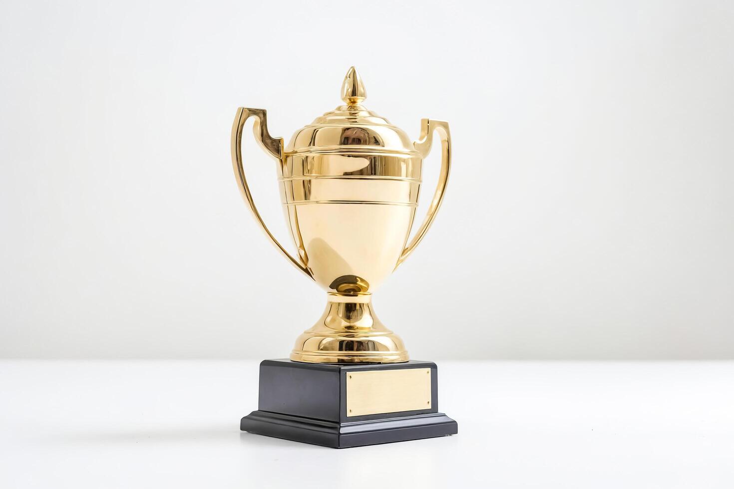 Gold Trophy with Blank Plaque on White Background photo