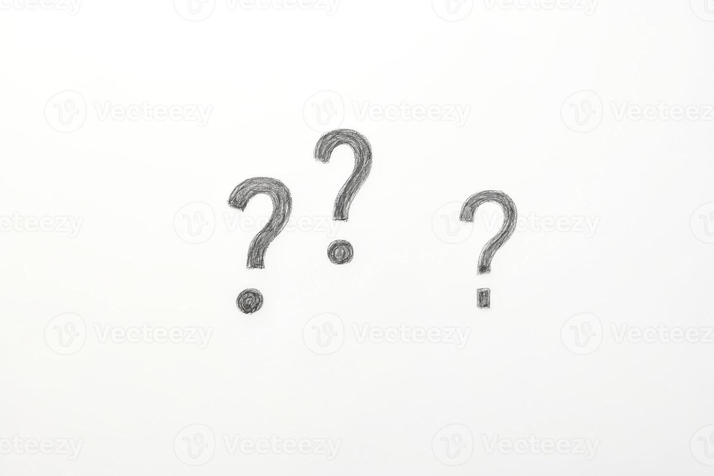 Hand-Drawn Question Marks on White Background photo