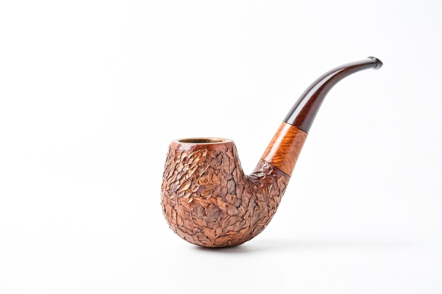 Ornate Tobacco Pipe with Leaf Pattern photo