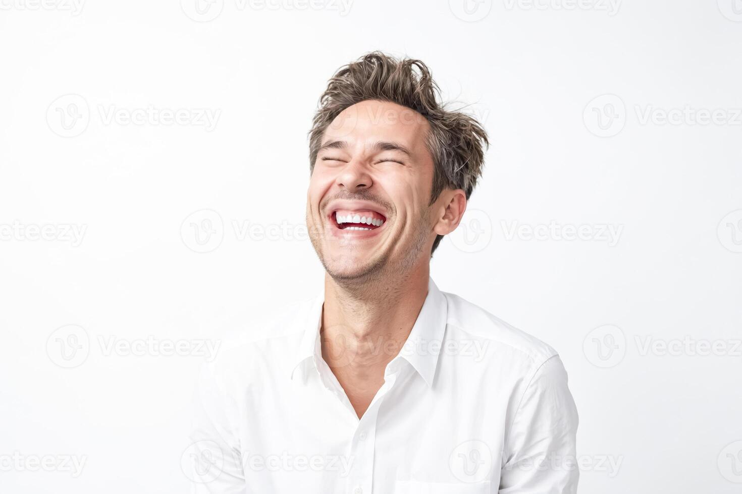 Happy man laughing with teeth showing photo