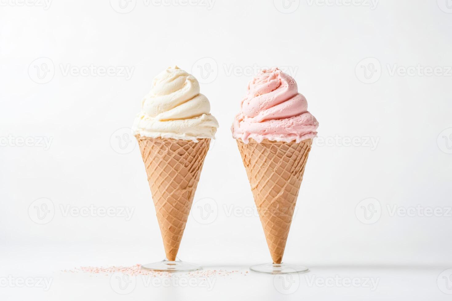 Two ice cream cones with strawberry ice cream on a white background photo