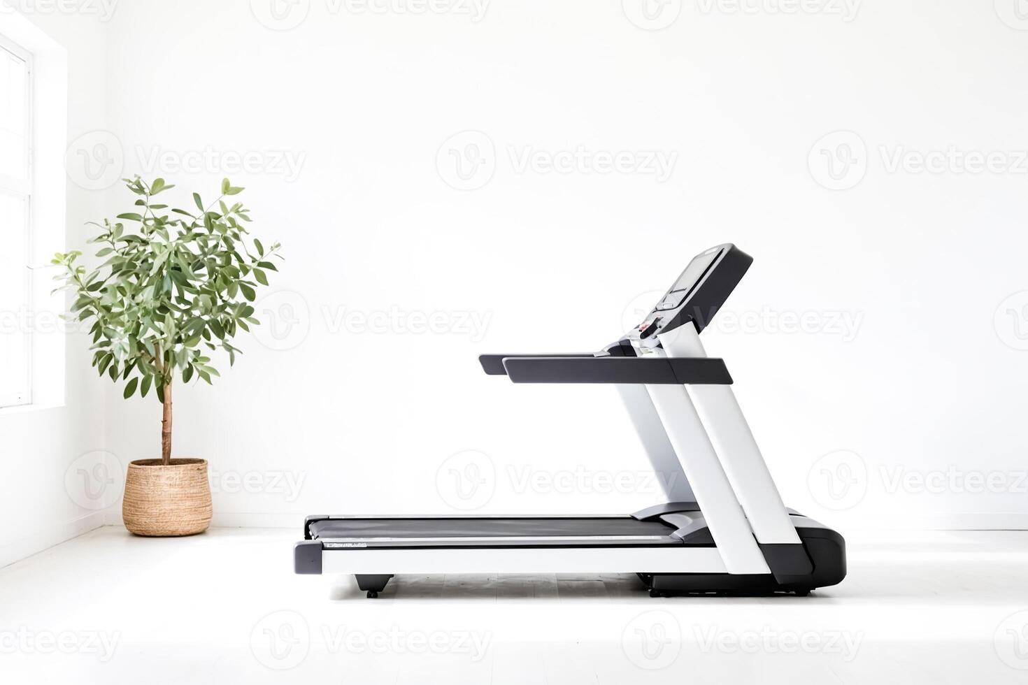 Modern treadmill in a bright room photo